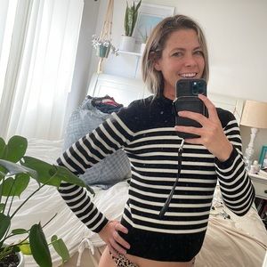 Sandro Paris sweater. Designer. Striped black and white with button detail.